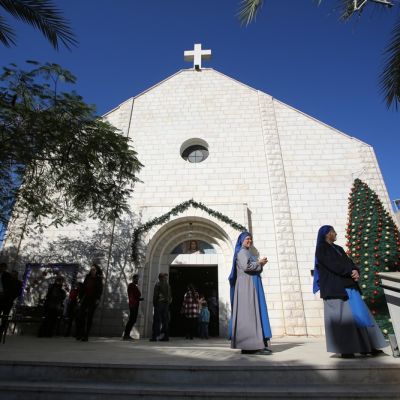 Palestinian,Christian,Worshipers,Gather,As,They,Attend,A,Ceremony,Inside